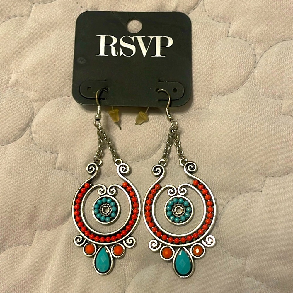 Ladies hanging RSVP pierced earrings and turquoise and coral